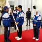 Wakil Ketua DPRD Tanah Bumbu H. Hasanuddin dampingi Bupati Andi Rudi Latif lepas 167 atlet pelajar ke POPDA Kalsel 2025, targetkan prestasi.