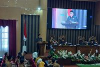 Gt Erwin Ariffin dari Fraksi NasDem Sejahtera menyampaikan pandangan umum fraksi dalam rapat paripurna DPRD Tanah Bumbu terkait Raperda pembentukan 17 desa baru, Selasa (7/10/2025).