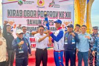Pemkab Kotabaru sambut Kirab Obor PORPROV XII Kalsel di Siring Laut dengan semangat sportivitas dan persatuan