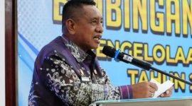 Wabup Tanah Laut memberikan sambutan saat membuka kegiatan Bimbingan Teknis Pengelolaan Arsip Tahun 2025 di Pelaihari, Kamis (6/11/2025).