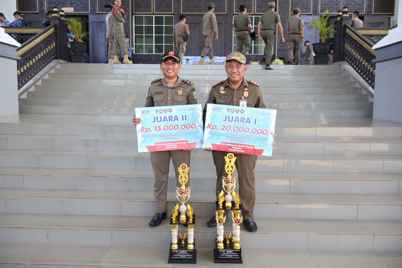 Tanah Bumbu meraih dua penghargaan provinsi melalui Pos Satlinmas dan Pos Kamling sebagai bukti komitmen menjaga keamanan lingkungan.