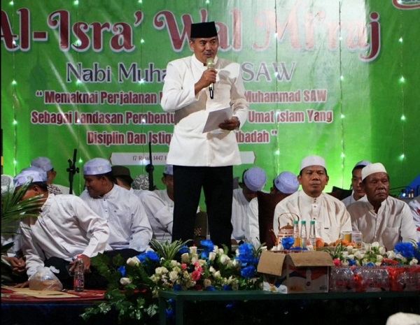 Staf Ahli Bidang Pemerintahan, Hukum, dan Politik Abdillah saat membacakan sambutan Bupati Tanah Laut H. Rahmat Trianto.