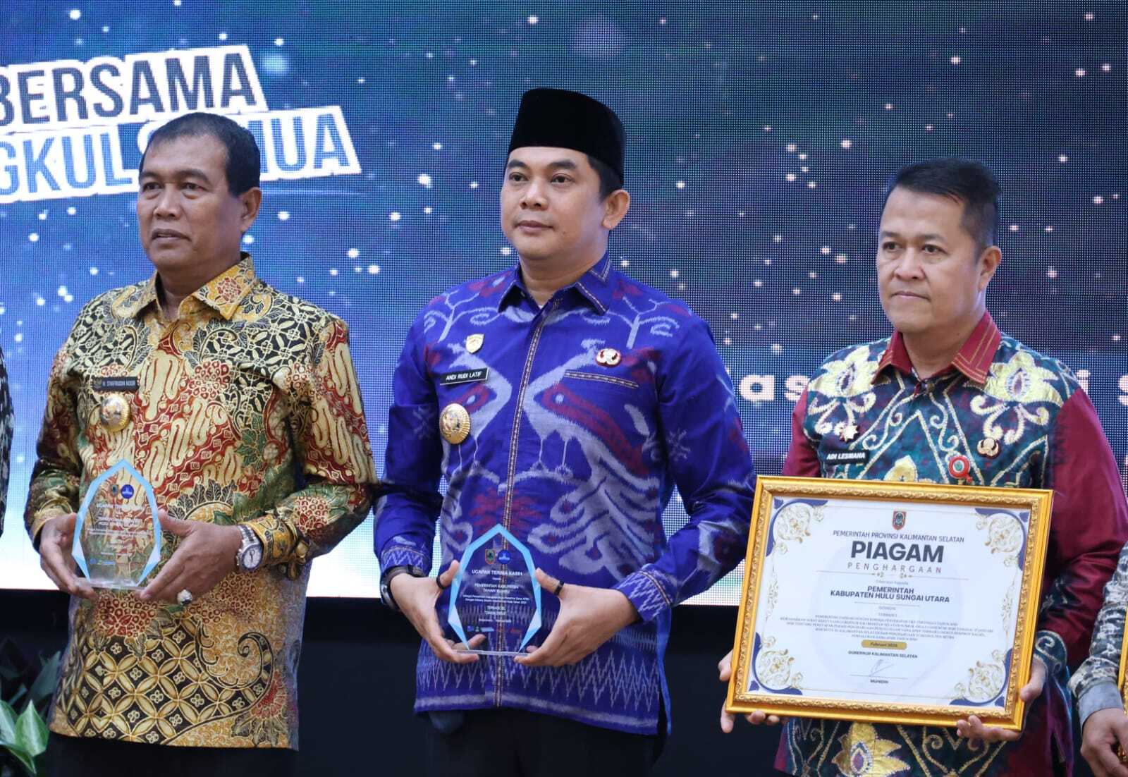 Pemerintah Kabupaten Tanah Bumbu meraih dua penghargaan sekaligus pada rakor Percepatan Pembangunan Kalsel 2026