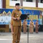 Bupati Tanah Laut H. Rahmat Trianto saat memimpin apel gabungan ASN di Pelaihari menjelang libur Idulfitri 1447 H.