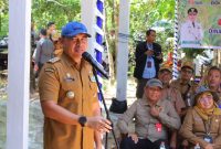Bupati Tanah Laut, H.Rahmat Trianto Saat Sambutan dalam acara kegiatan panen padi serentak di 11 kecamatan untuk memotivasi petani dalam memacu produktivitas sektor pertanian, yang berpusat di Desa Maluka Baulin, Kecamatan Kurau, Senin (13/07/2026).