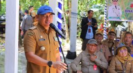 Bupati Tanah Laut, H.Rahmat Trianto Saat Sambutan dalam acara kegiatan panen padi serentak di 11 kecamatan untuk memotivasi petani dalam memacu produktivitas sektor pertanian, yang berpusat di Desa Maluka Baulin, Kecamatan Kurau, Senin (13/07/2026).